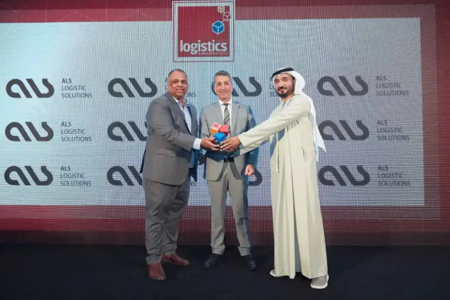Air Cargo Operator of the Year trophy handed over in front of an ALS-branded screen at the Logistics Middle East Awards 2022